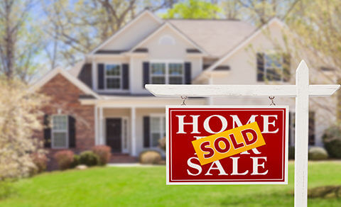 Home With A Sold Sign