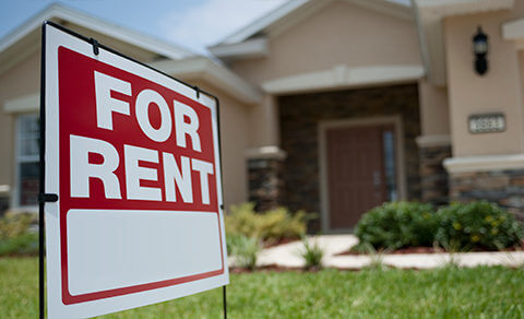 House With A For Rent Sign In Front Of It