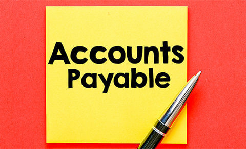 Red Beckground With Yellow Post It That Says Accounts Payable