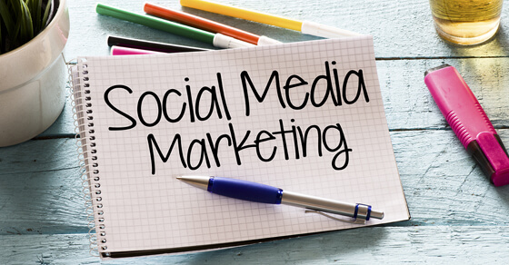 Notepad On A Desk Wth Social Media Marketing Written On It Surrounded By Colored Pencils And A Potted Plant