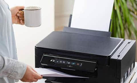 Office Job. Secretary Or Office Manager Woman Using Printer, Scanner Or Laser Copy Machine.