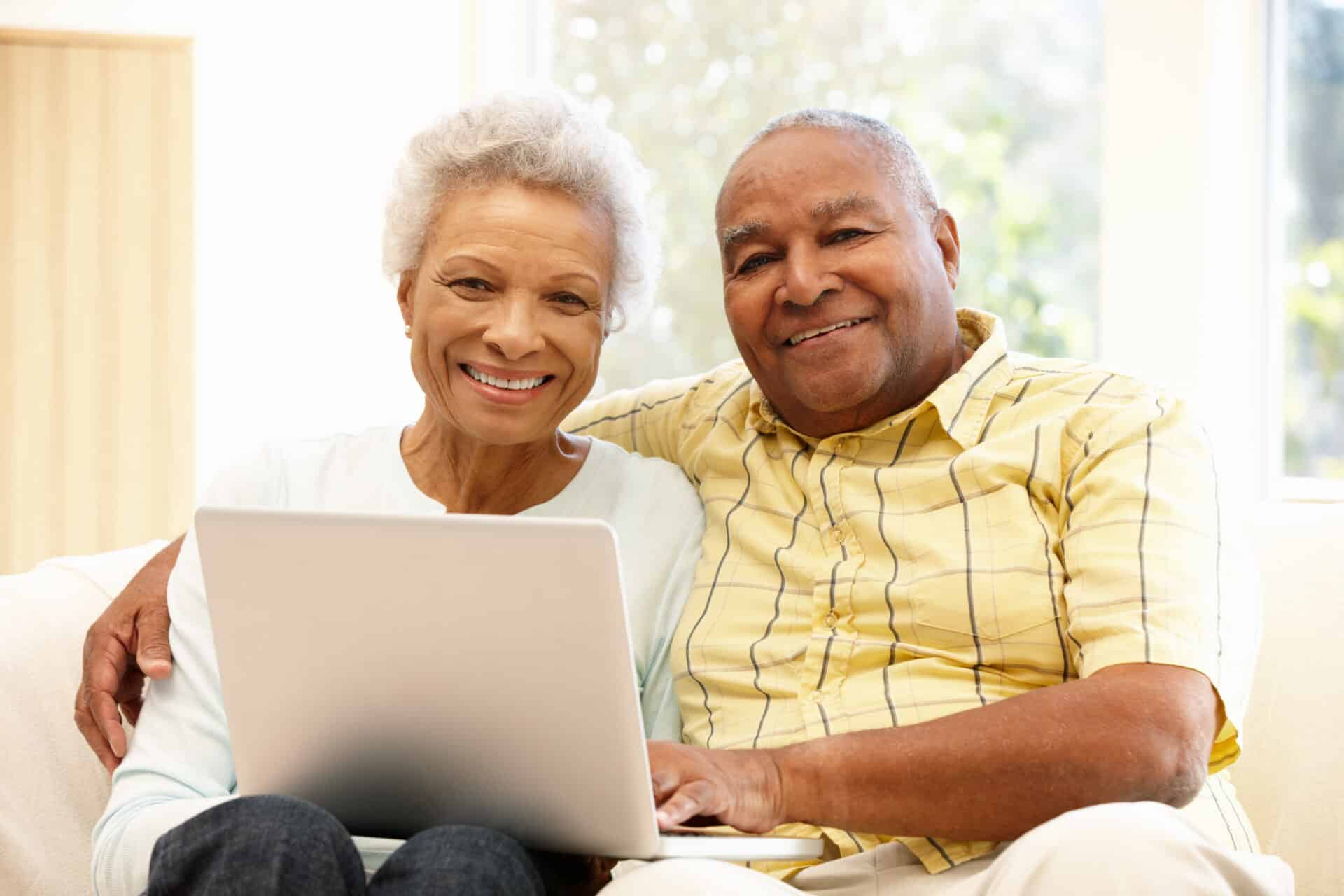 Senior African American Couple Using Laptop