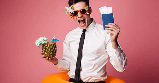 Happy,man,in,sunglasses,and,official,shirt,showing,cocktail,and