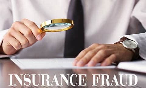 Insurance,fraud,concept.,man,inspecting,document,with,magnifier