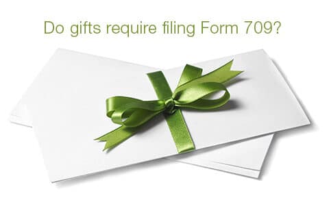 White envelopes with a green bow - Do gifts require filing Form709?