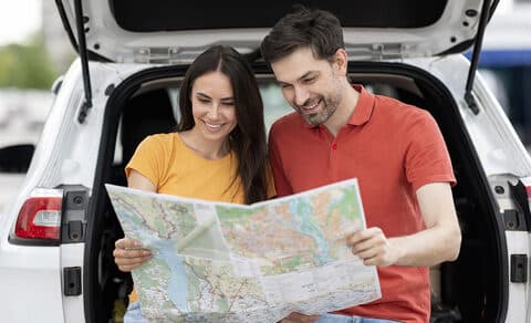 Happy Couple Travellers Having Car Trip Together, Reading Map