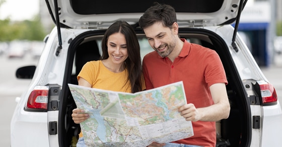 Happy Couple Travellers Having Car Trip Together, Reading Map