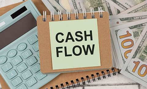 Cash,flow,text,concept,on,notebook,with,office,tools,and