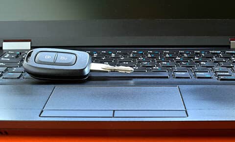 Car,key,in,laptop,,copy,space