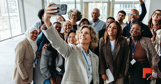 A,diverse,group,of,professionals,taking,a,cheerful,selfie,together