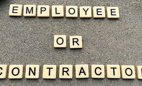 Concept,image,of,tiles,spelling,employee,or,contractor