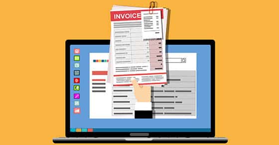 A laptop, invoices, a hand, digital billing, online payments, electronic records.