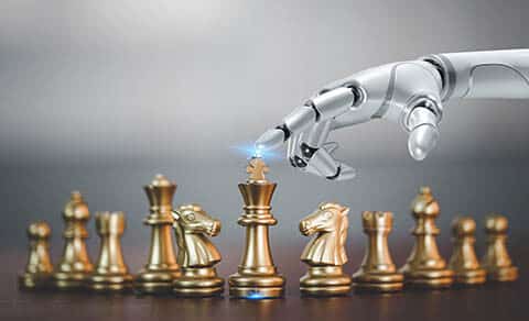 Close Up,of,a,robot's,hand,playing,chess