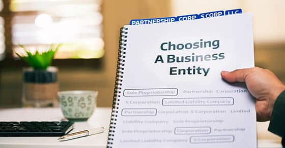 A,document,on,different,types,of,business,formations,being,read