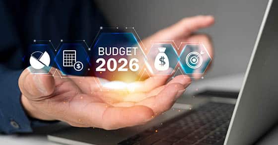 Hand,holding,virtual,budget, ,interface,with,finance,icons,and