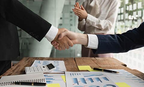 Business,people,shaking,hands,,finishing,up,meeting.,business,merger,and