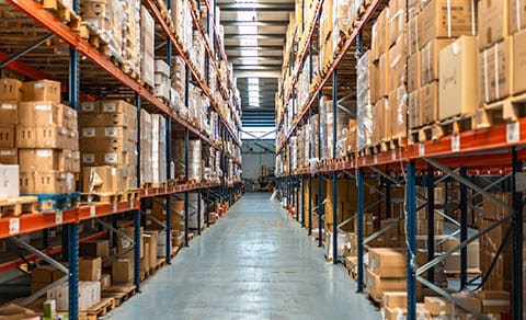 Interior,view,of,an,aisle,of,a,distribution,warehouse,full