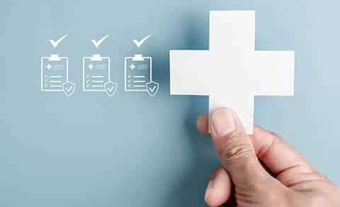 Healthcare,insurance,concept,with,medical,cross,and,checklist.,health,coverage,