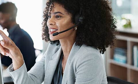 Happy,woman,,call,center,and,headphones,in,customer,service,,telemarketing