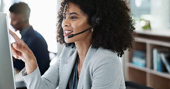 Happy,woman,,call,center,and,headphones,in,customer,service,,telemarketing