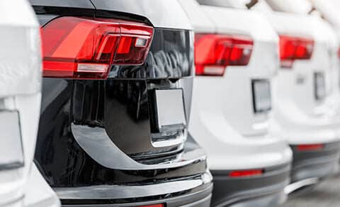 Back,view,many,modern,new,suv,cars,fleet,stock,at