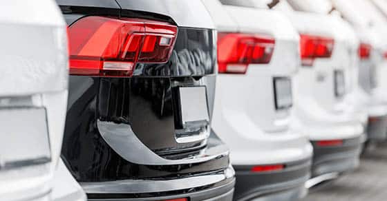 What’s your potential business vehicle deduction? Back,view,many,modern,new,suv,cars,fleet,stock,at